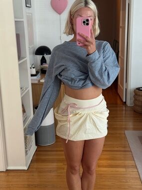 Mode mischief pouf mini skirt buttercream w/ pink tie